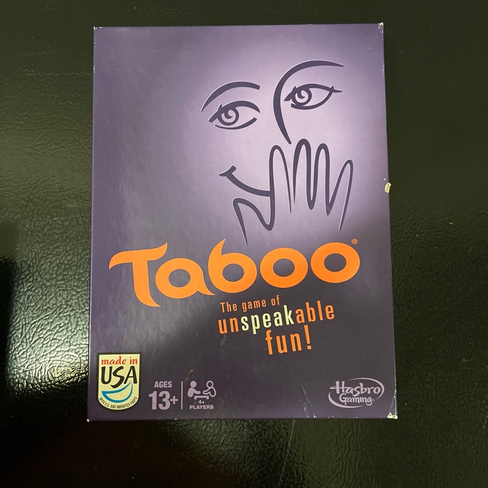 Hasbro Taboo Game with Purple and Orange Design